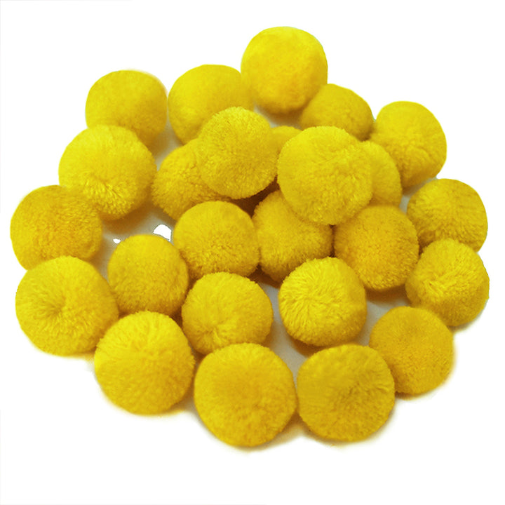 yellow pom pom balls