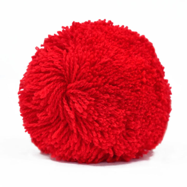 Red pom pom for decorating bags