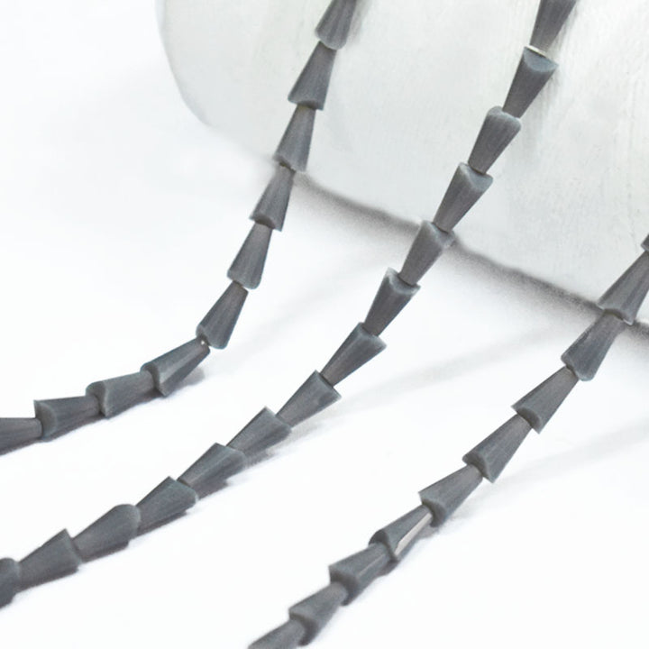 Bluish grey color cone faceted beads 