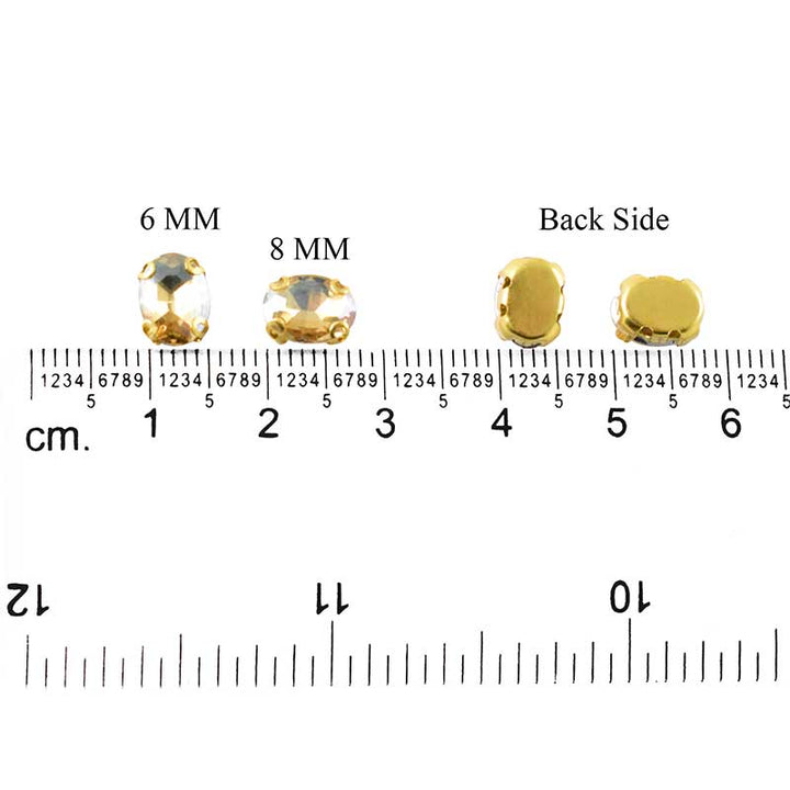 Golden shadow crystal in setting