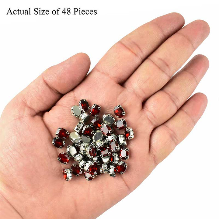 maroon crystal in setting  