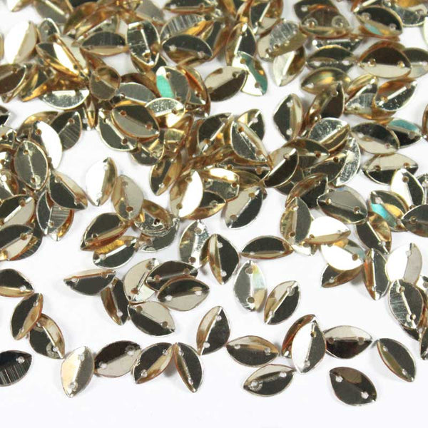 EMBSQ4954 (6x9MM Folded Leaf Shape Light Gold Color Sequins)