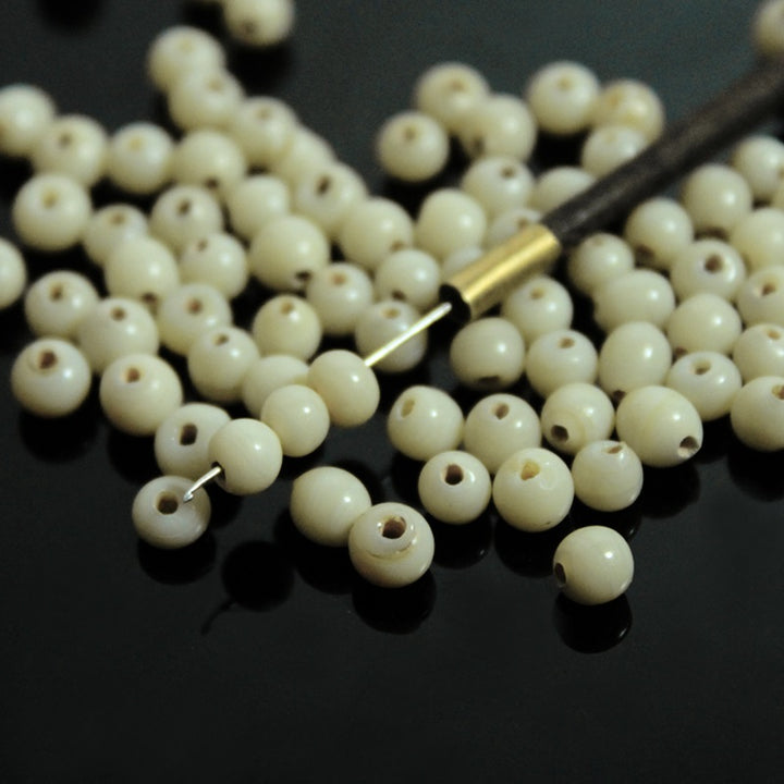 Cream Color Round Shape Ceramic Beads