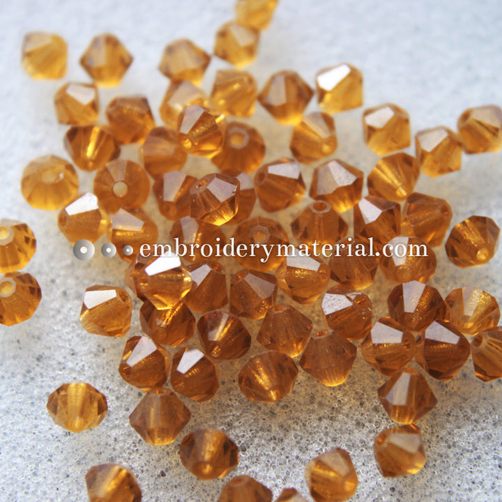 gold faceted bicone crystals