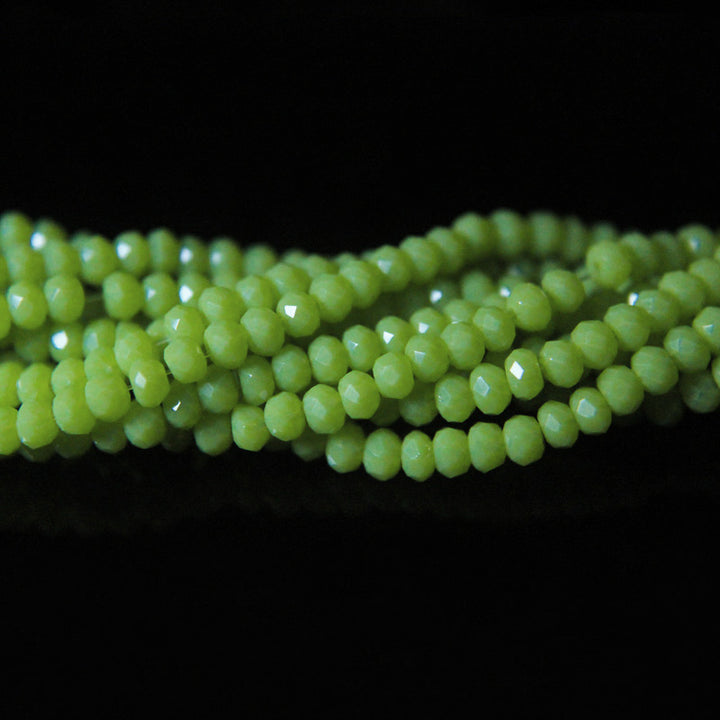 green faceted stone beads